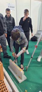 Predstavitev gradbenih poklicev in izvedba tekmovanja slikopleskarjev  na sejmu Megra